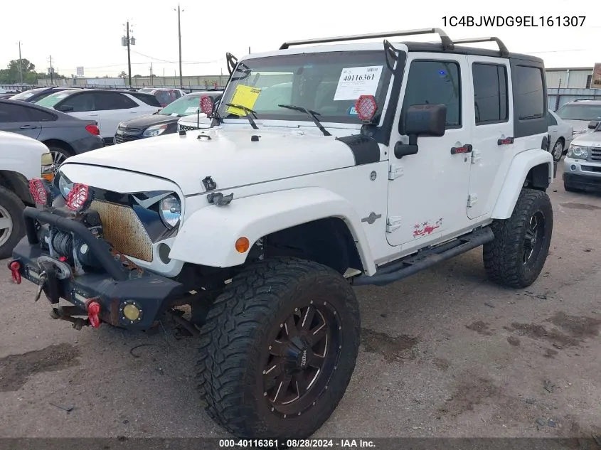 1C4BJWDG9EL161307 2014 Jeep Wrangler Unlimited Freedom Edition