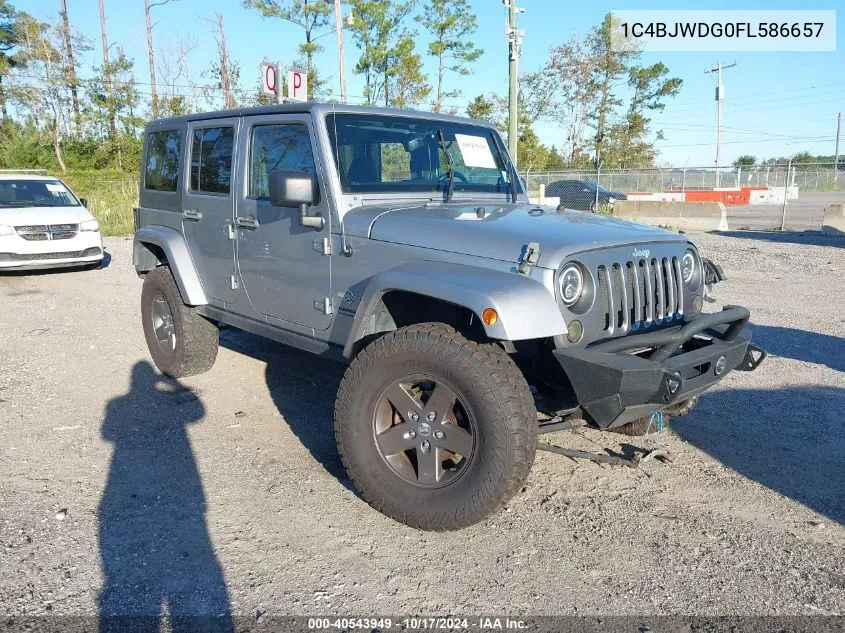 2015 Jeep Wrangler Unlimited Freedom Edition VIN: 1C4BJWDG0FL586657 Lot: 40543949