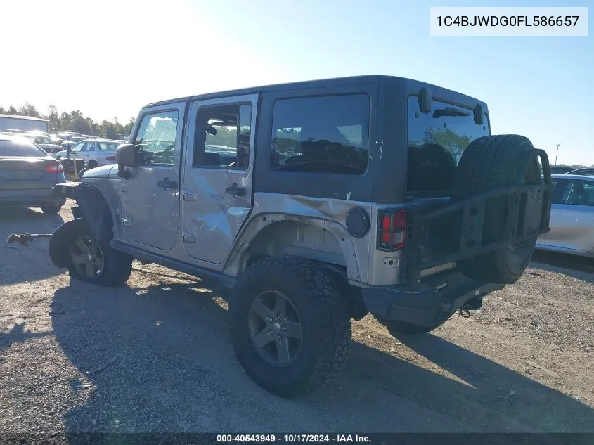 2015 Jeep Wrangler Unlimited Freedom Edition VIN: 1C4BJWDG0FL586657 Lot: 40543949