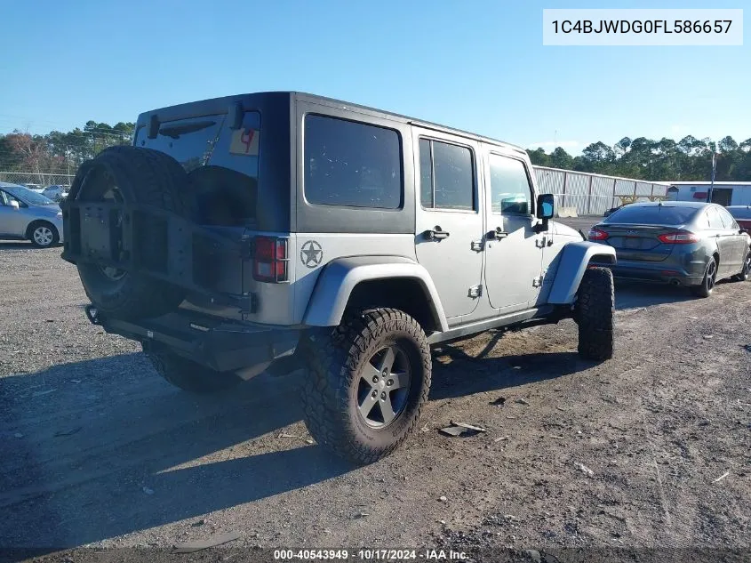 2015 Jeep Wrangler Unlimited Freedom Edition VIN: 1C4BJWDG0FL586657 Lot: 40543949