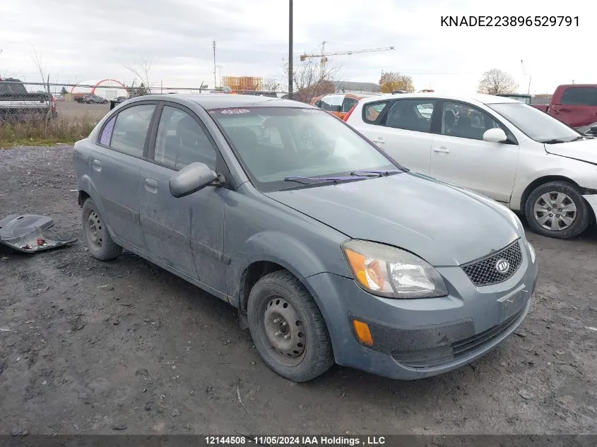 2009 Kia Rio VIN: KNADE223896529791 Lot: 12144508