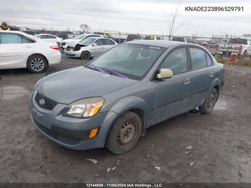 2009 Kia Rio VIN: KNADE223896529791 Lot: 12144508