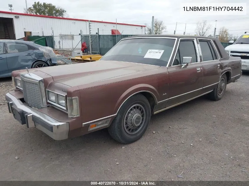 1987 Lincoln Town Car VIN: 1LNBM81F1HY704442 Lot: 40722070