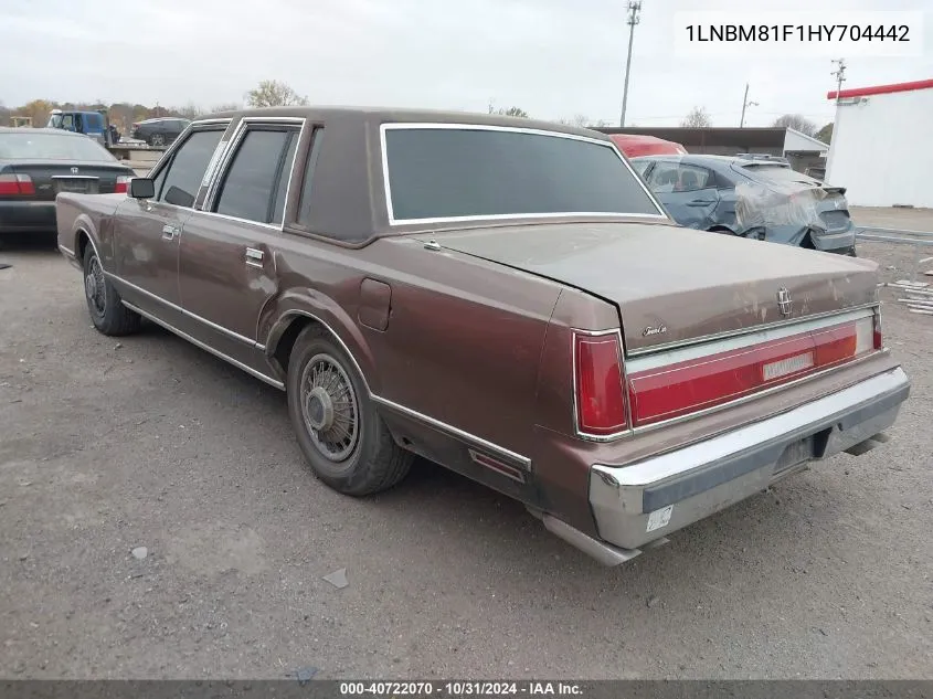 1987 Lincoln Town Car VIN: 1LNBM81F1HY704442 Lot: 40722070