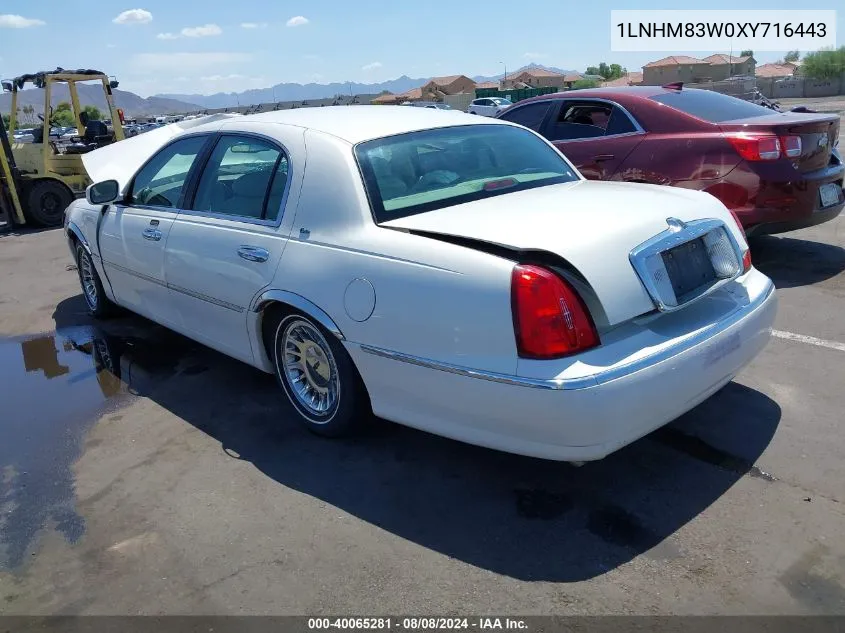 1999 Lincoln Town Car Cartier VIN: 1LNHM83W0XY716443 Lot: 40065281