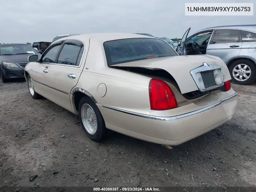 1999 Lincoln Town Car Cartier VIN: 1LNHM83W9XY706753 Lot: 40388387