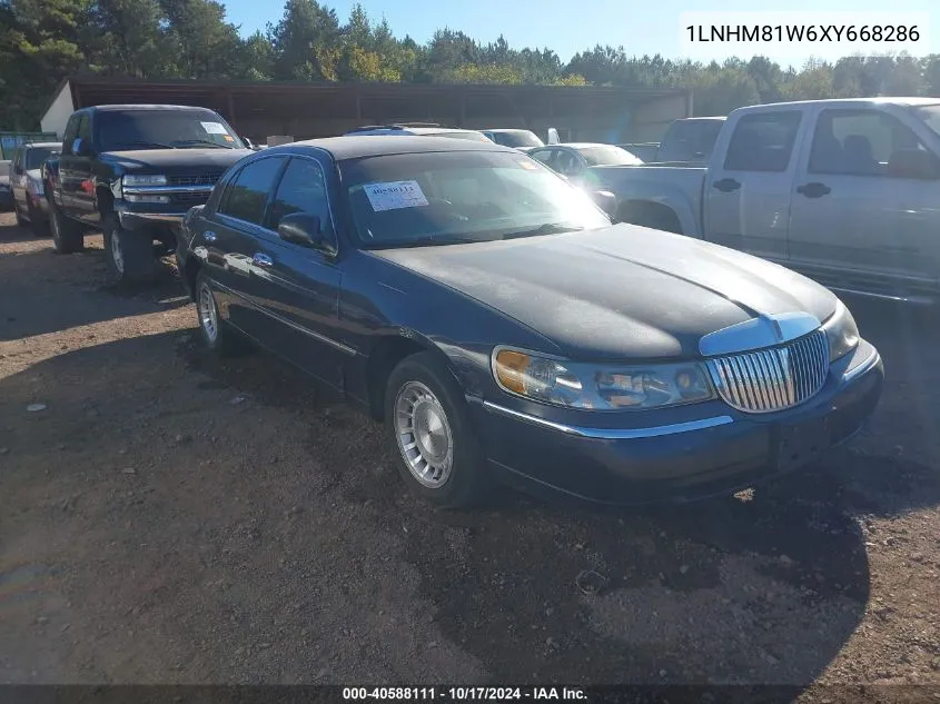 1999 Lincoln Town Car Executive VIN: 1LNHM81W6XY668286 Lot: 40588111