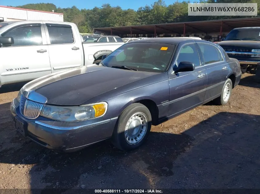 1999 Lincoln Town Car Executive VIN: 1LNHM81W6XY668286 Lot: 40588111