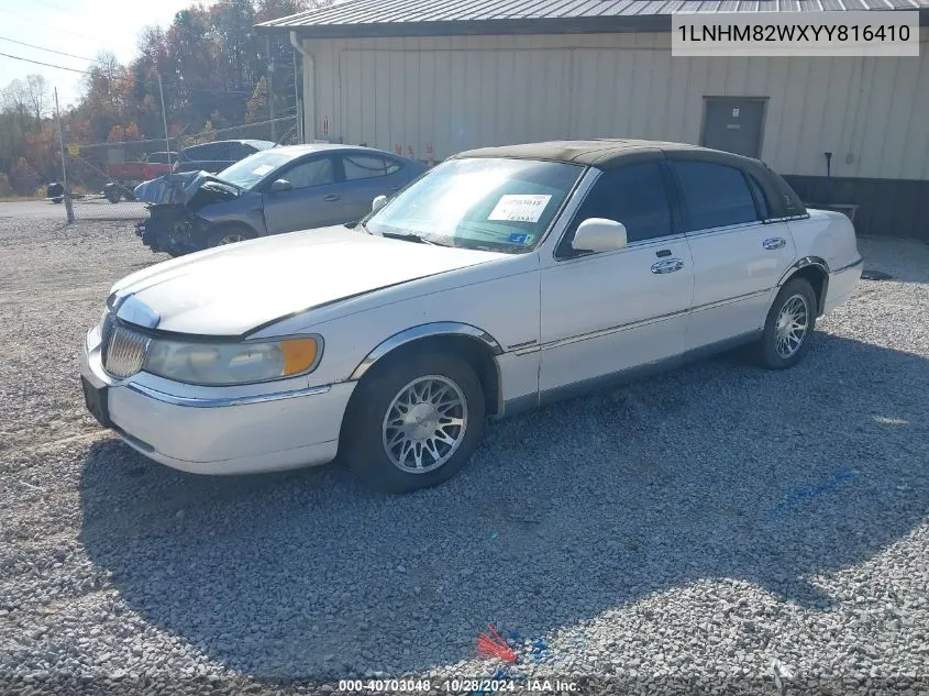 2000 Lincoln Town Car Signature VIN: 1LNHM82WXYY816410 Lot: 40703048