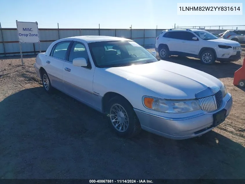 2000 Lincoln Town Car Signature VIN: 1LNHM82W2YY831614 Lot: 40867881