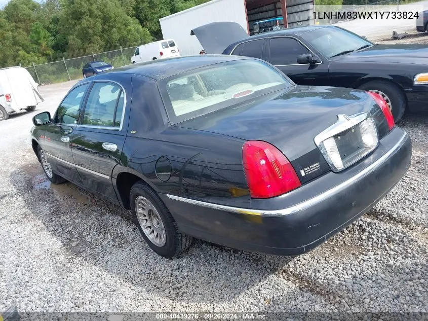 2001 Lincoln Town Car Cartier VIN: 1LNHM83WX1Y733824 Lot: 40439276