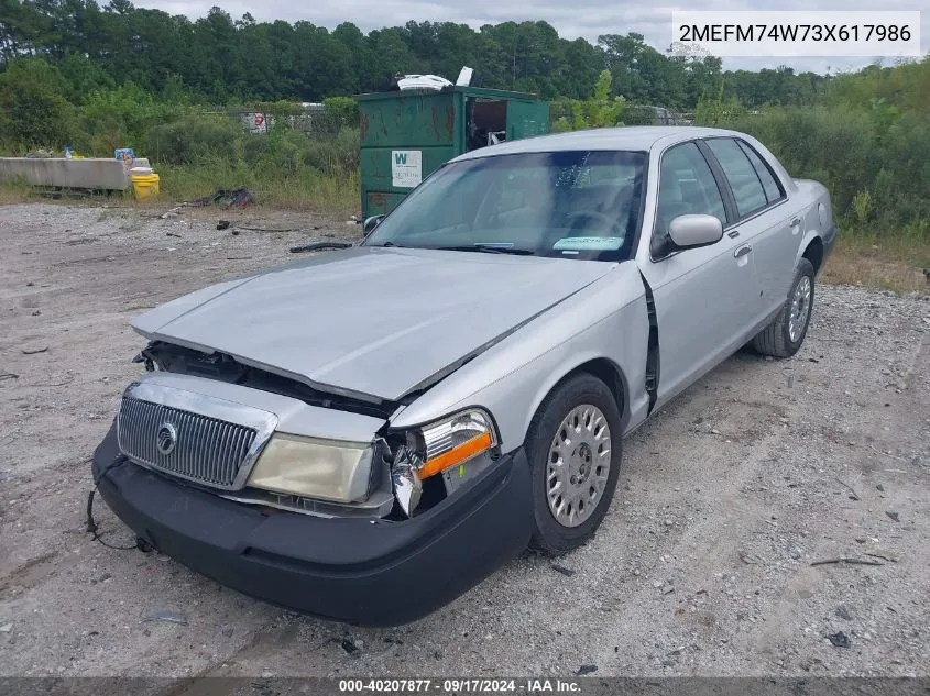 2003 Mercury Grand Marquis Gs VIN: 2MEFM74W73X617986 Lot: 40207877