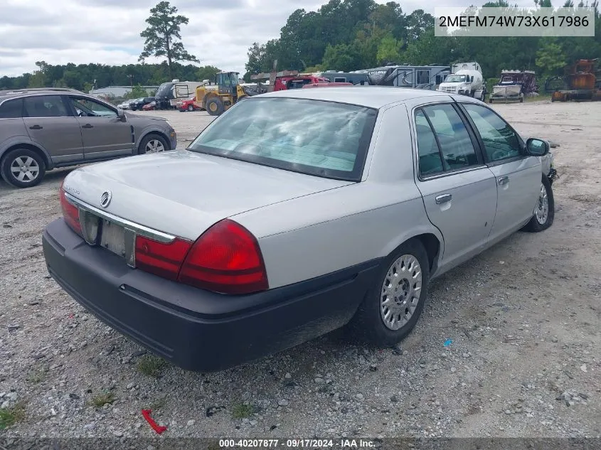 2003 Mercury Grand Marquis Gs VIN: 2MEFM74W73X617986 Lot: 40207877