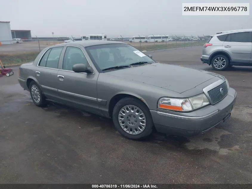 2003 Mercury Grand Marquis Gs VIN: 2MEFM74WX3X696778 Lot: 40786319