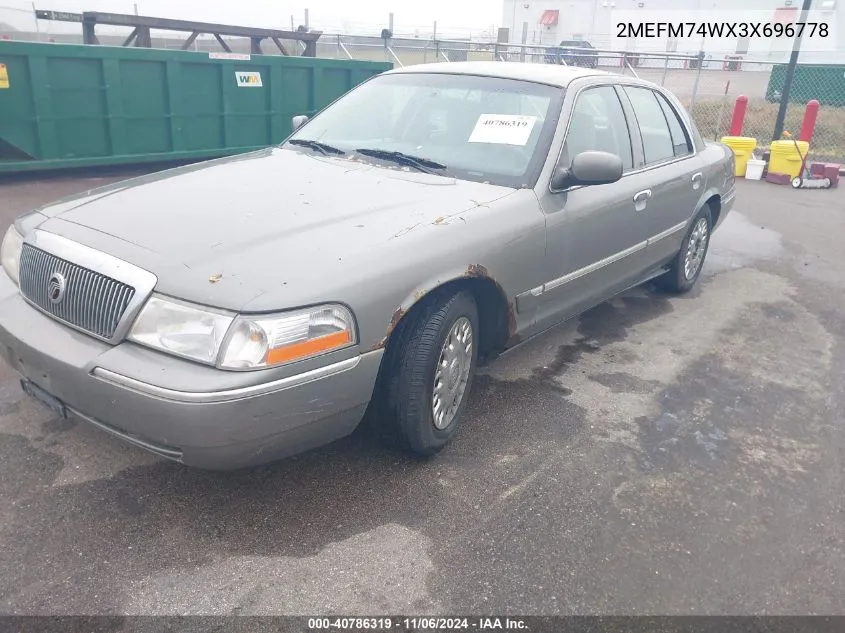 2003 Mercury Grand Marquis Gs VIN: 2MEFM74WX3X696778 Lot: 40786319