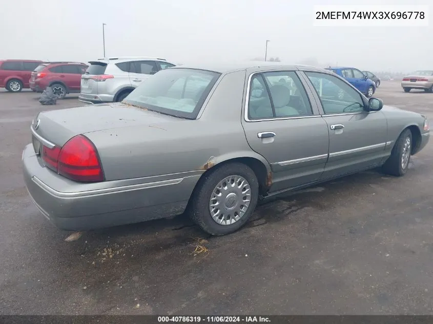 2003 Mercury Grand Marquis Gs VIN: 2MEFM74WX3X696778 Lot: 40786319