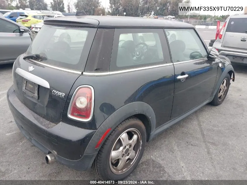 2009 Mini Cooper VIN: WMWMF335X9TU70229 Lot: 40414573