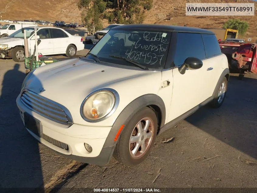 2009 Mini Cooper VIN: WMWMF33549TT68991 Lot: 40814537