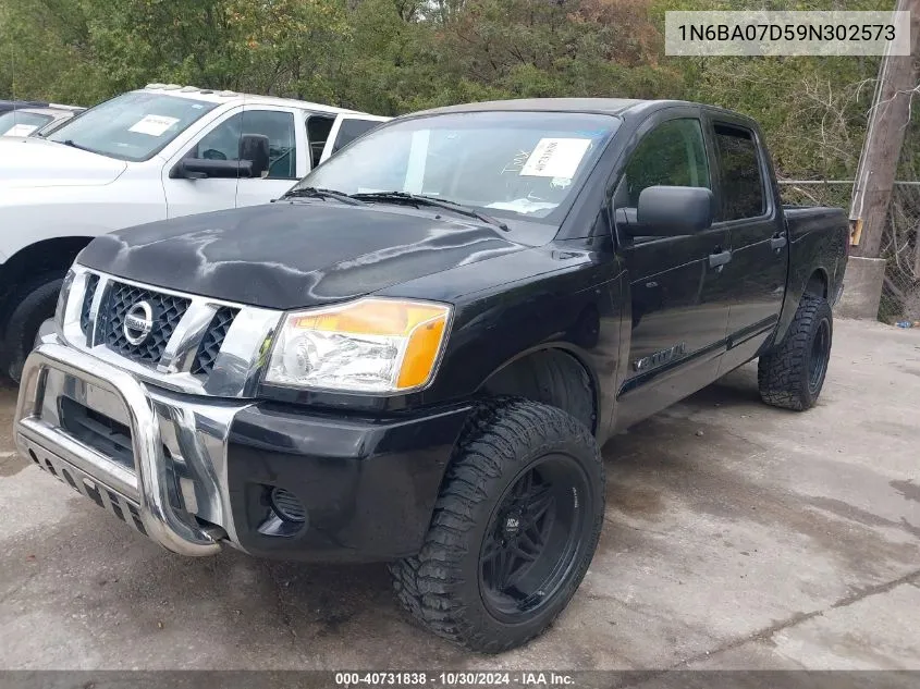 1N6BA07D59N302573 2009 Nissan Titan Se