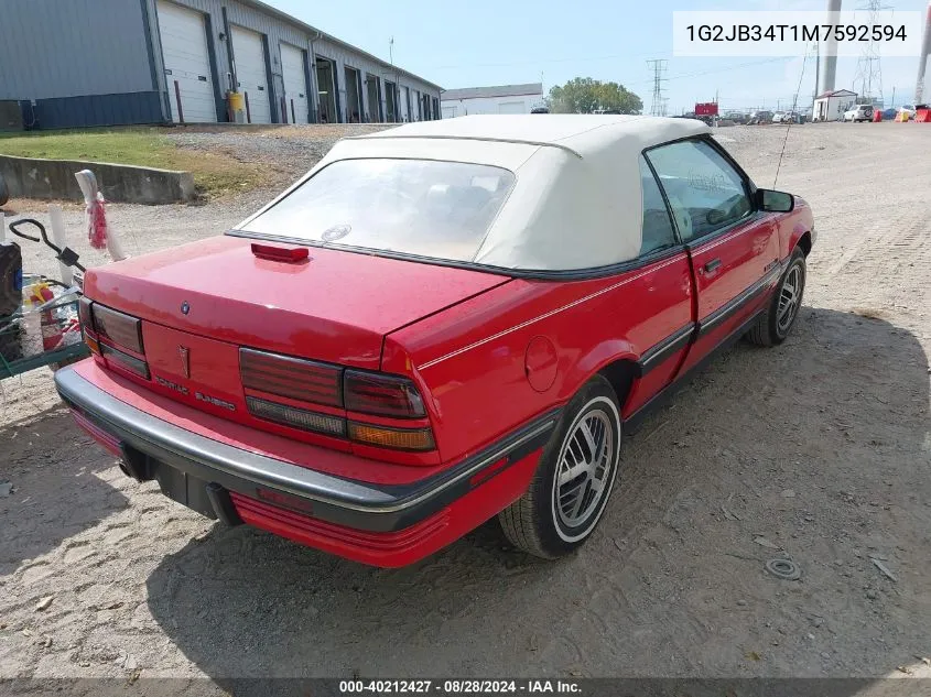 1991 Pontiac Sunbird Le VIN: 1G2JB34T1M7592594 Lot: 40212427