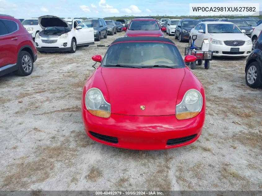 1999 Porsche Boxster VIN: WP0CA2981XU627582 Lot: 40492979