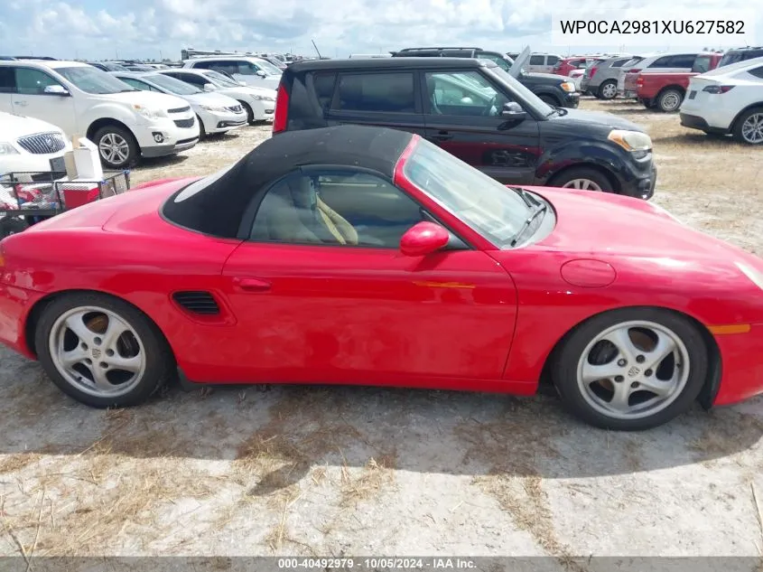 1999 Porsche Boxster VIN: WP0CA2981XU627582 Lot: 40492979