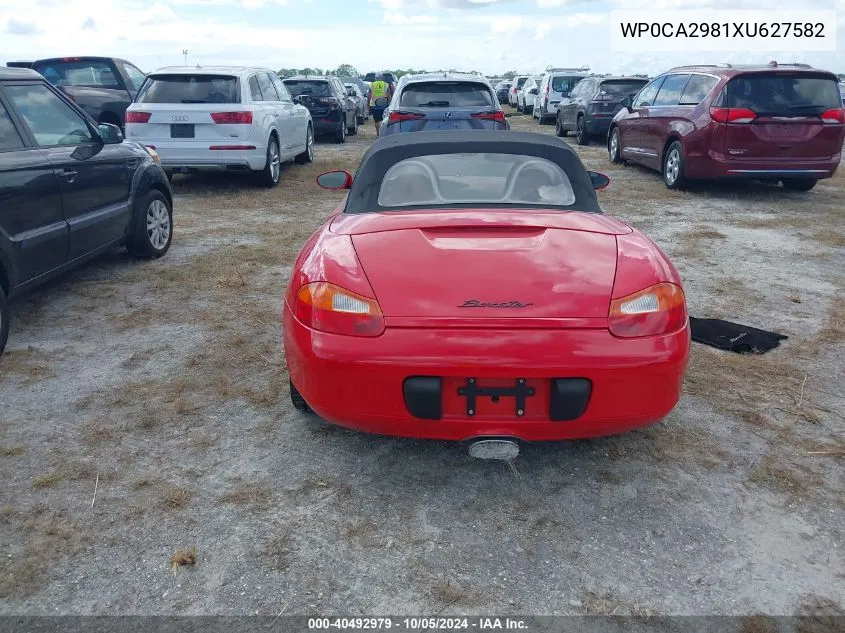 1999 Porsche Boxster VIN: WP0CA2981XU627582 Lot: 40492979