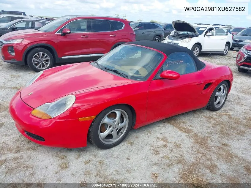 1999 Porsche Boxster VIN: WP0CA2981XU627582 Lot: 40492979