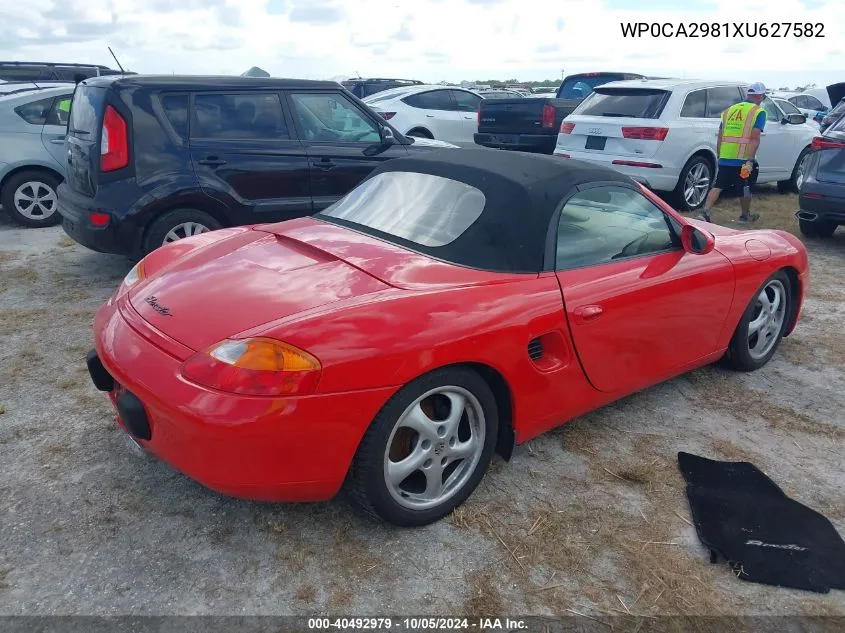 1999 Porsche Boxster VIN: WP0CA2981XU627582 Lot: 40492979