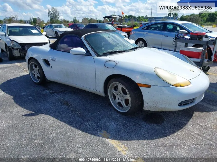 1999 Porsche Boxster VIN: WP0CA2988XU628986 Lot: 40786062