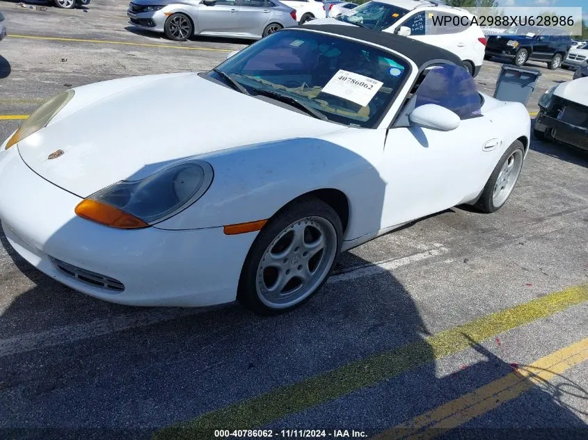 1999 Porsche Boxster VIN: WP0CA2988XU628986 Lot: 40786062