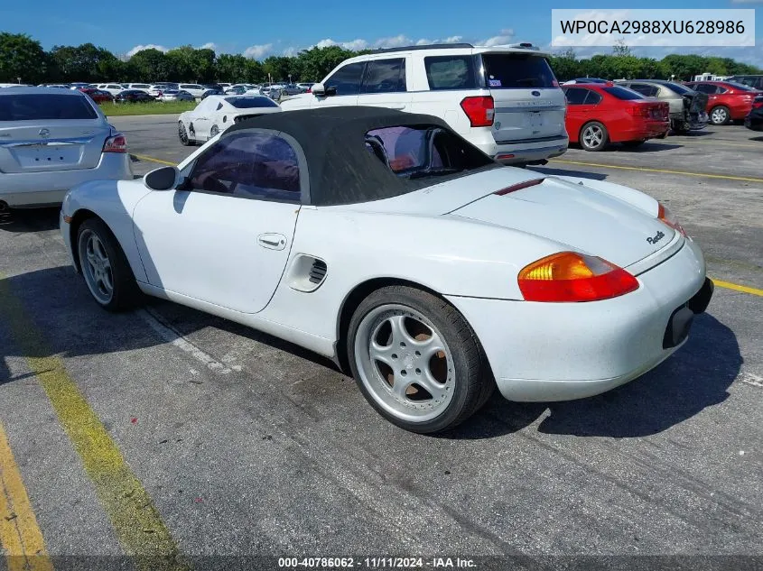 1999 Porsche Boxster VIN: WP0CA2988XU628986 Lot: 40786062