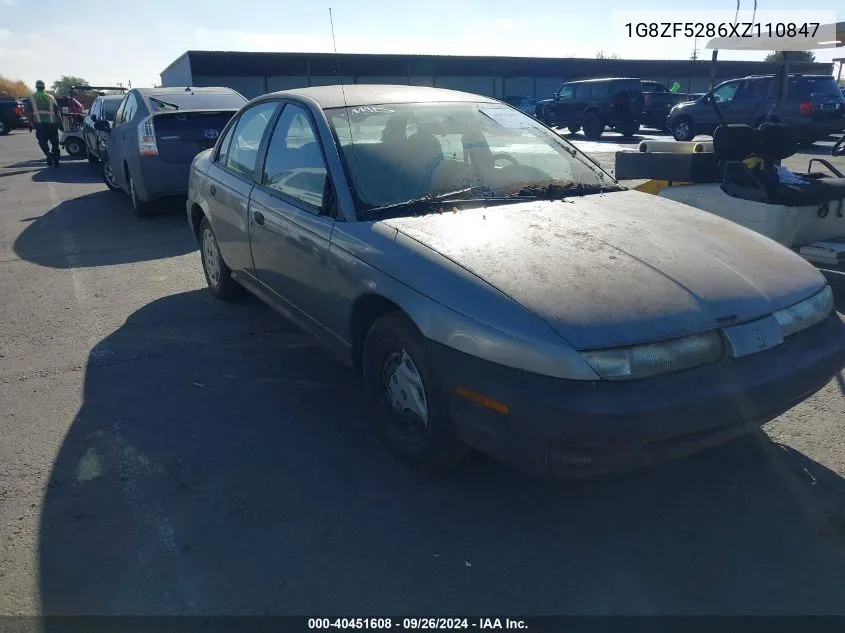 1999 Saturn Sl VIN: 1G8ZF5286XZ110847 Lot: 40451608