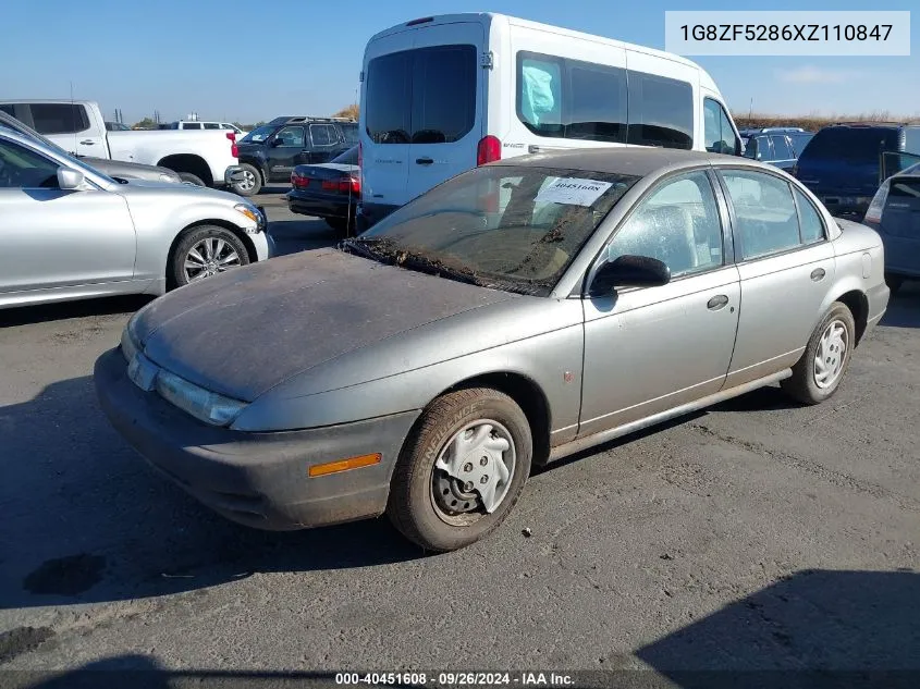 1999 Saturn Sl VIN: 1G8ZF5286XZ110847 Lot: 40451608