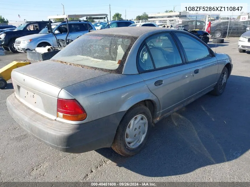 1999 Saturn Sl VIN: 1G8ZF5286XZ110847 Lot: 40451608