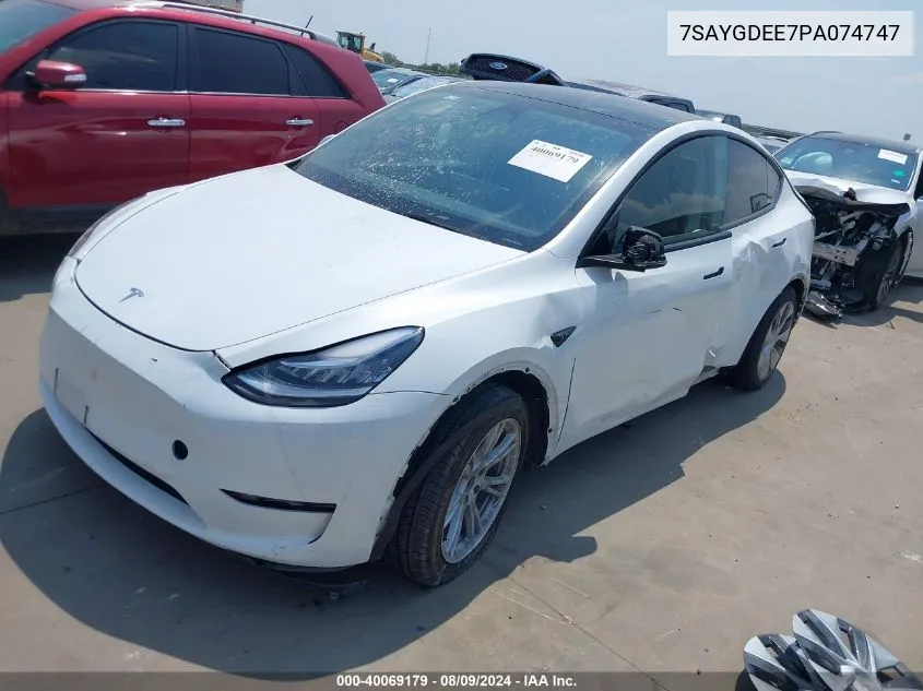 2023 Tesla Model Y Awd/Long Range Dual Motor All-Wheel Drive VIN: 7SAYGDEE7PA074747 Lot: 40069179