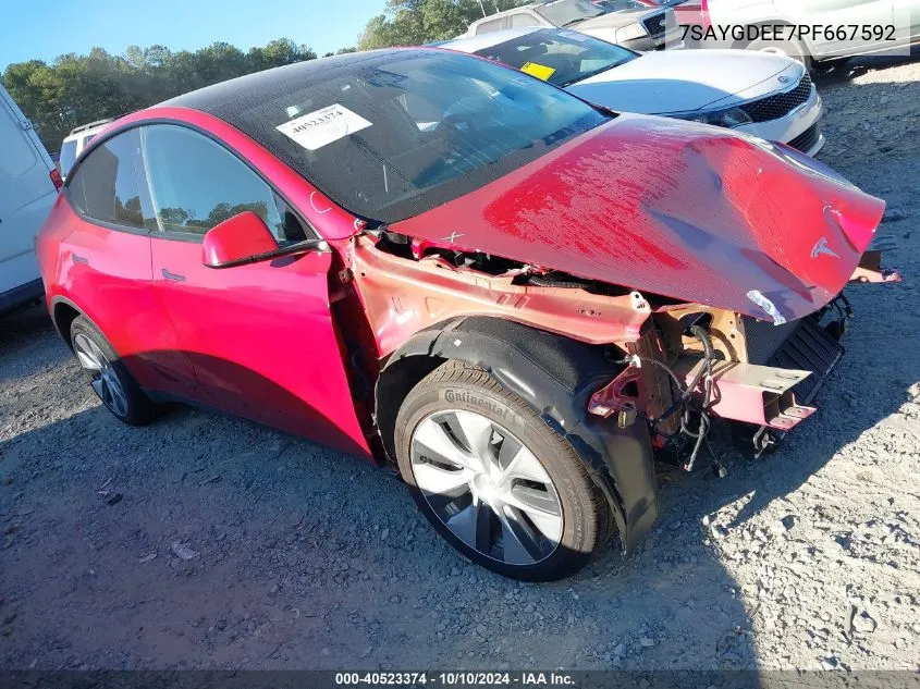 2023 Tesla Model Y Awd/Long Range Dual Motor All-Wheel Drive VIN: 7SAYGDEE7PF667592 Lot: 40523374