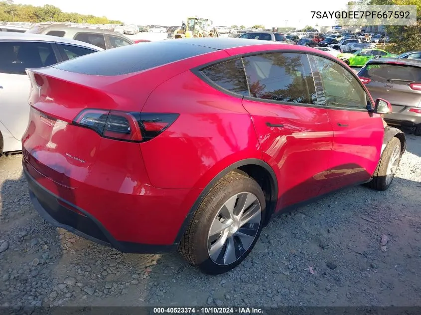 2023 Tesla Model Y Awd/Long Range Dual Motor All-Wheel Drive VIN: 7SAYGDEE7PF667592 Lot: 40523374