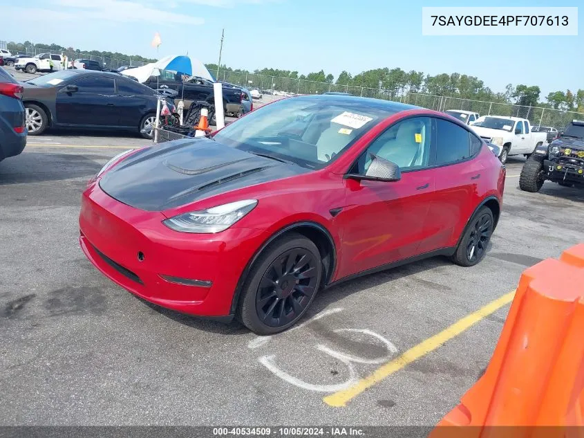 2023 Tesla Model Y Awd/Long Range Dual Motor All-Wheel Drive VIN: 7SAYGDEE4PF707613 Lot: 40534509