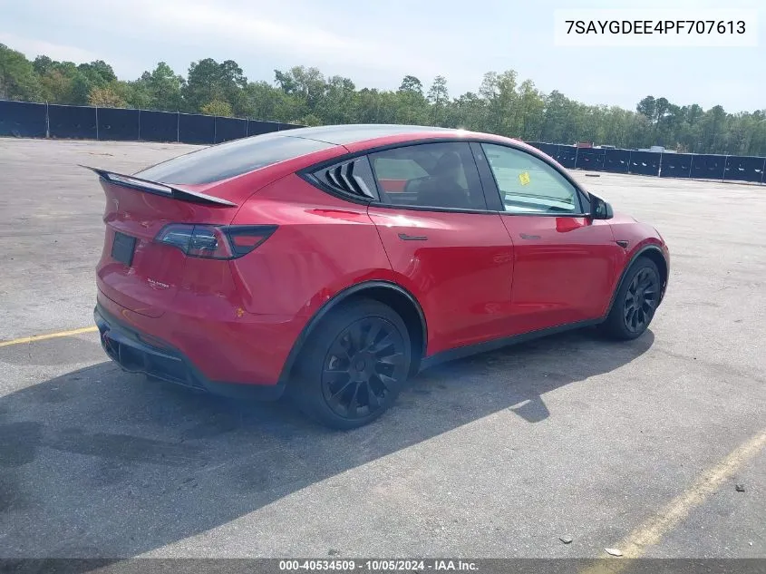 2023 Tesla Model Y Awd/Long Range Dual Motor All-Wheel Drive VIN: 7SAYGDEE4PF707613 Lot: 40534509