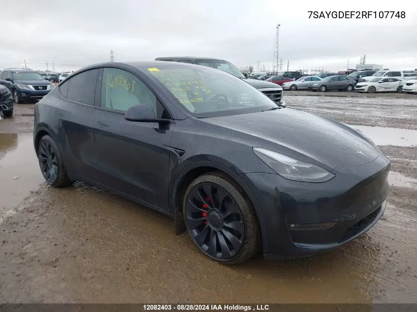 2024 Tesla Model Y VIN: 7SAYGDEF2RF107748 Lot: 12082403