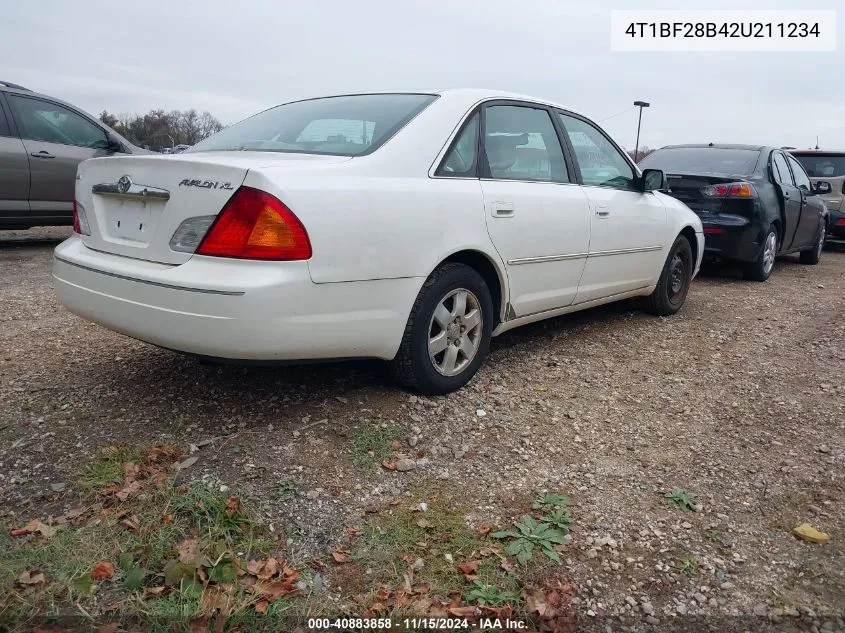 2002 Toyota Avalon Xl VIN: 4T1BF28B42U211234 Lot: 40883858