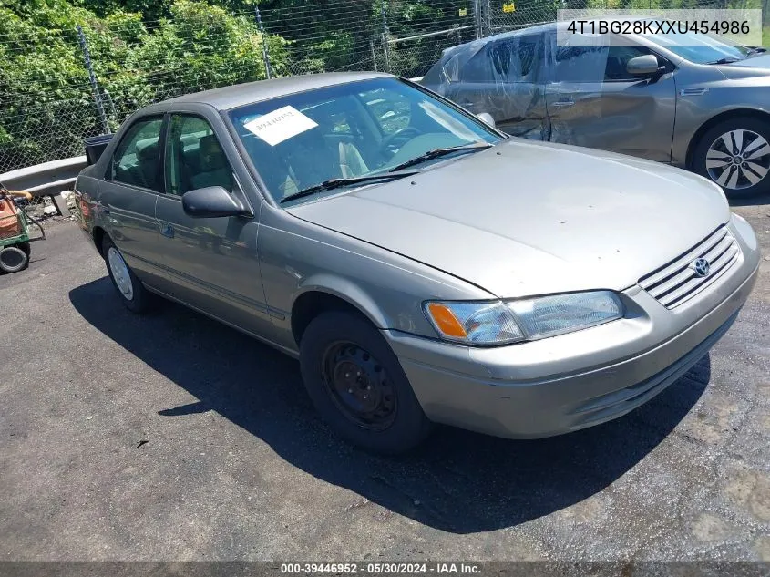 1999 Toyota Camry Le VIN: 4T1BG28KXXU454986 Lot: 39446952