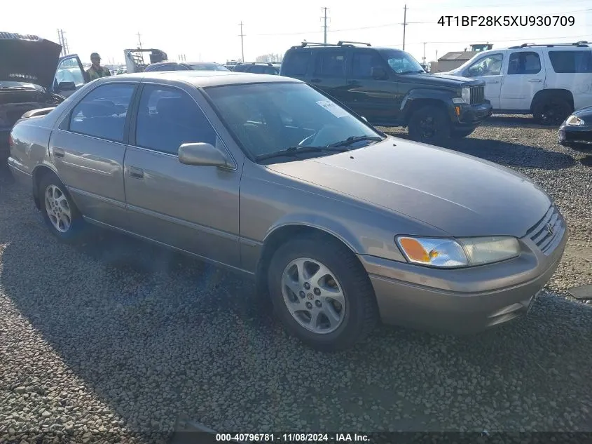 1999 Toyota Camry Le V6 VIN: 4T1BF28K5XU930709 Lot: 40796781