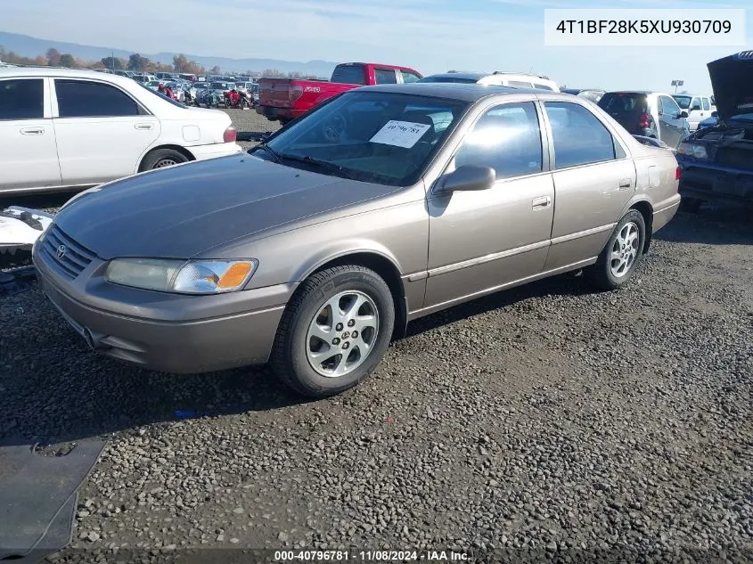 1999 Toyota Camry Le V6 VIN: 4T1BF28K5XU930709 Lot: 40796781