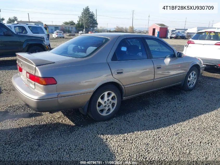 1999 Toyota Camry Le V6 VIN: 4T1BF28K5XU930709 Lot: 40796781