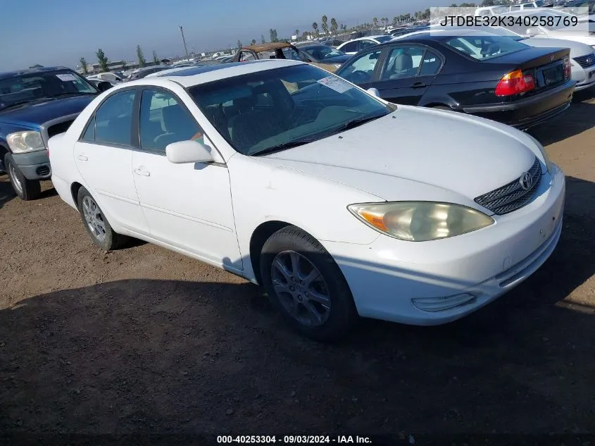 2004 Toyota Camry Le VIN: JTDBE32K340258769 Lot: 40253304