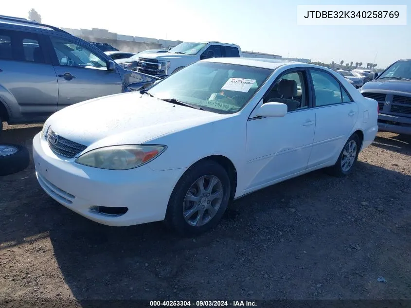 2004 Toyota Camry Le VIN: JTDBE32K340258769 Lot: 40253304