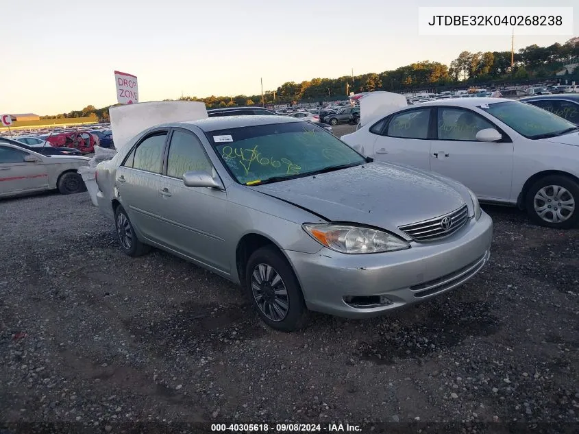 2004 Toyota Camry Le VIN: JTDBE32K040268238 Lot: 40305618