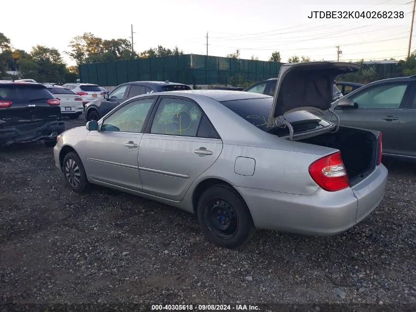 2004 Toyota Camry Le VIN: JTDBE32K040268238 Lot: 40305618